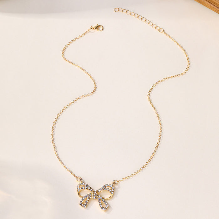 Wholesale New fashion jewelry, diamond studded alloy pendant, niche bow necklace