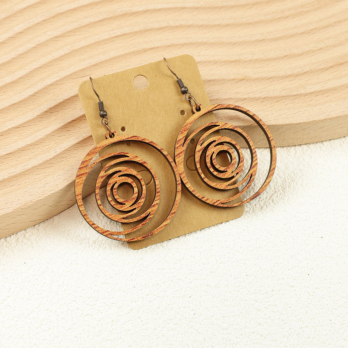 Wholesale Retro Holiday Versatile Bohemian Style Leopard Print Wooden Hollow Women' s Earrings Round Earrings