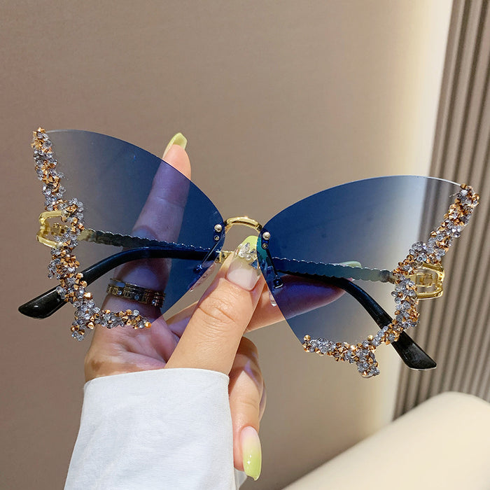 Wholesale New butterfly studded diamond rimless sunglasses with fashionable and exaggerated personality