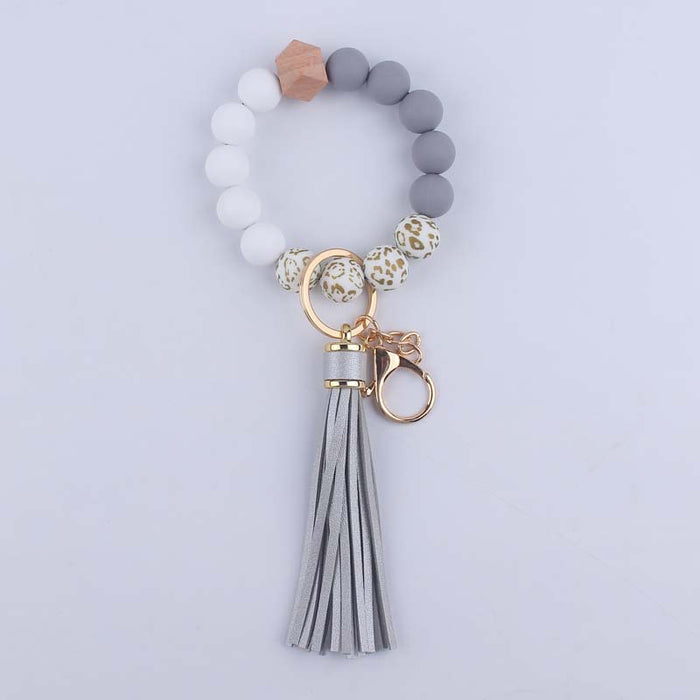 Wholesale Silicone leopard beads wrist keychain pendant leather PU tassel beaded bracelet accessories