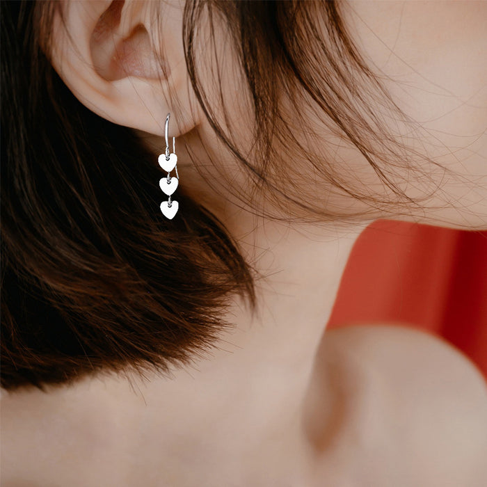 Wholesale Heart shaped earrings, women's light luxury handmade heart-shaped tassel ear hook