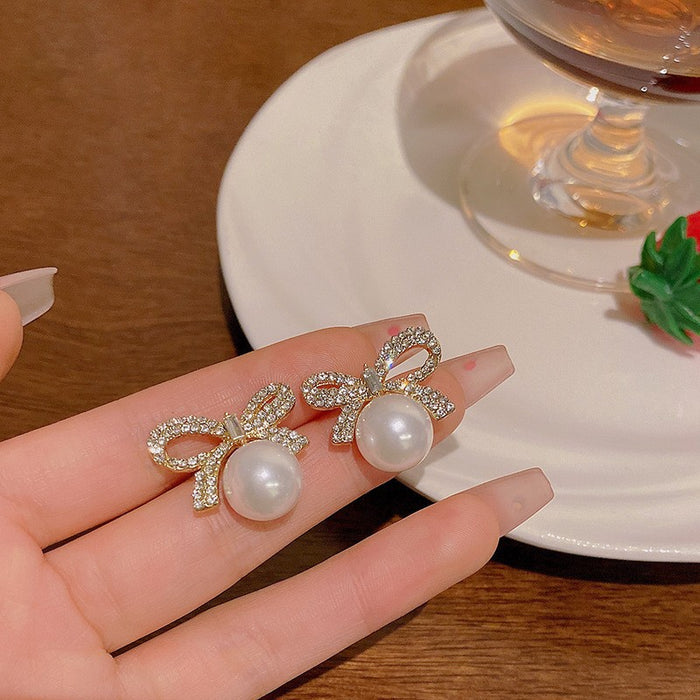 Wholesale Luxury bow earrings, niche design, pearl earrings, elegant earrings