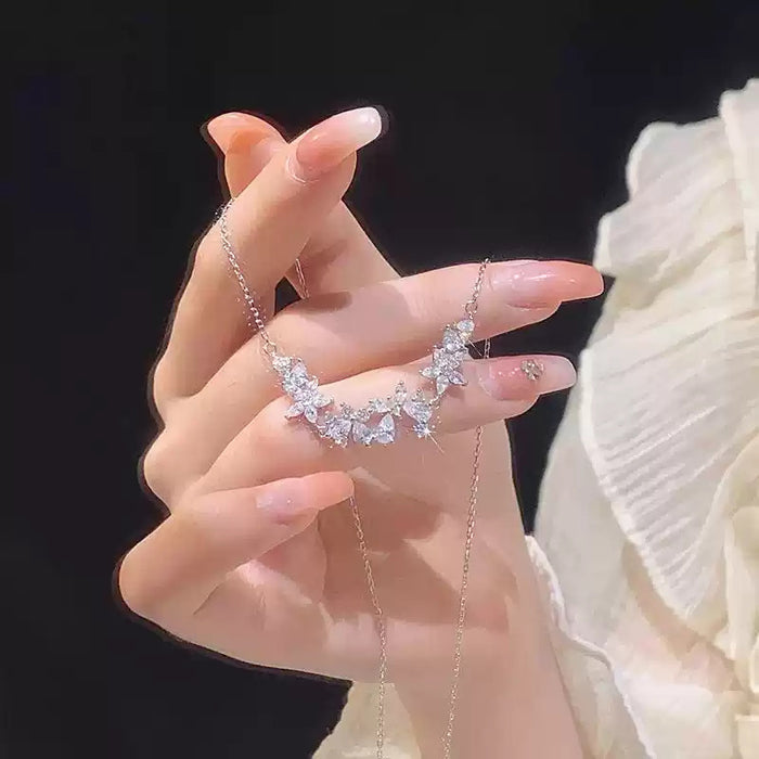 Wholesale Silver necklace for women, niche design, light luxury flower collarbone chain, zircon pendant