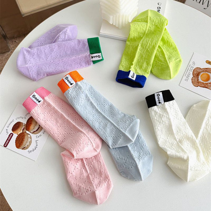 Wholesale Color blocked socks with hollowed out mesh and breathable lettering fabric label, colored midsole socks