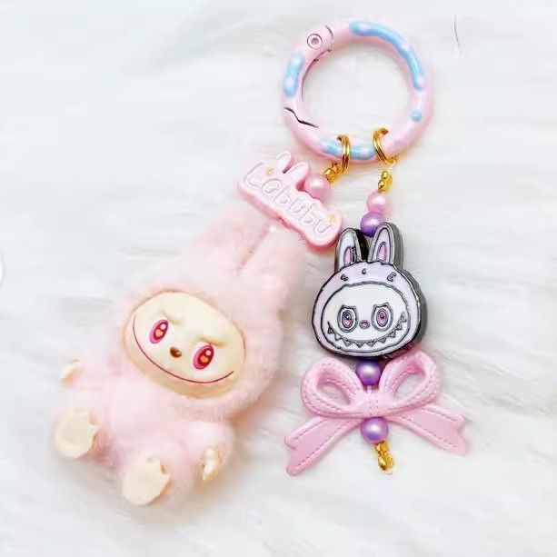 Wholesale Flocking mini keychain baby-free vinyl cute grain mobile phone pendant trendy accessories