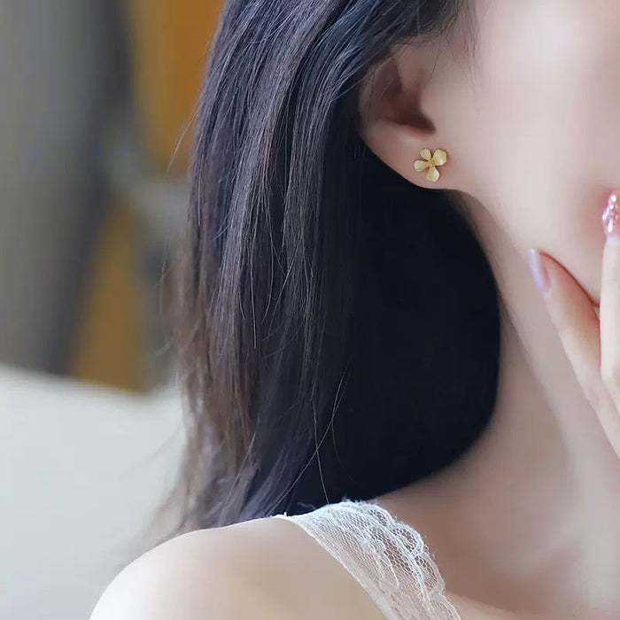 Wholesale Gold plated earrings, simple and fashionable floral earrings design, niche