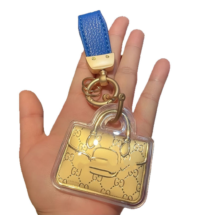 Wholesale Cute gold-colored bag keychain