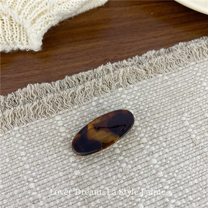 Wholesale Leopard print cross bow geometric hair clip, fashionable grip clip, versatile hair accessory