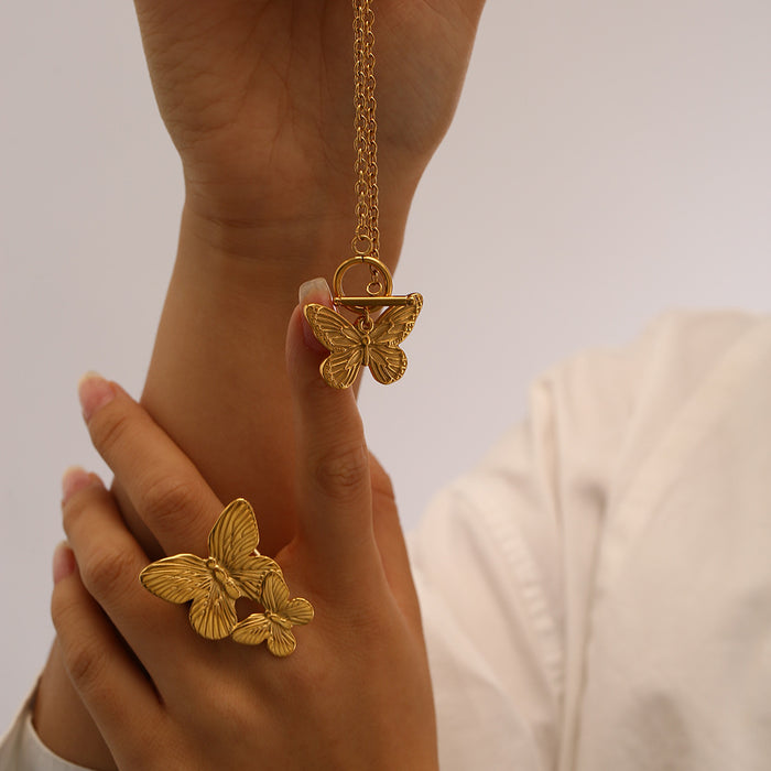 Wholesale Exaggerated personality stainless steel butterfly necklace ring earring set