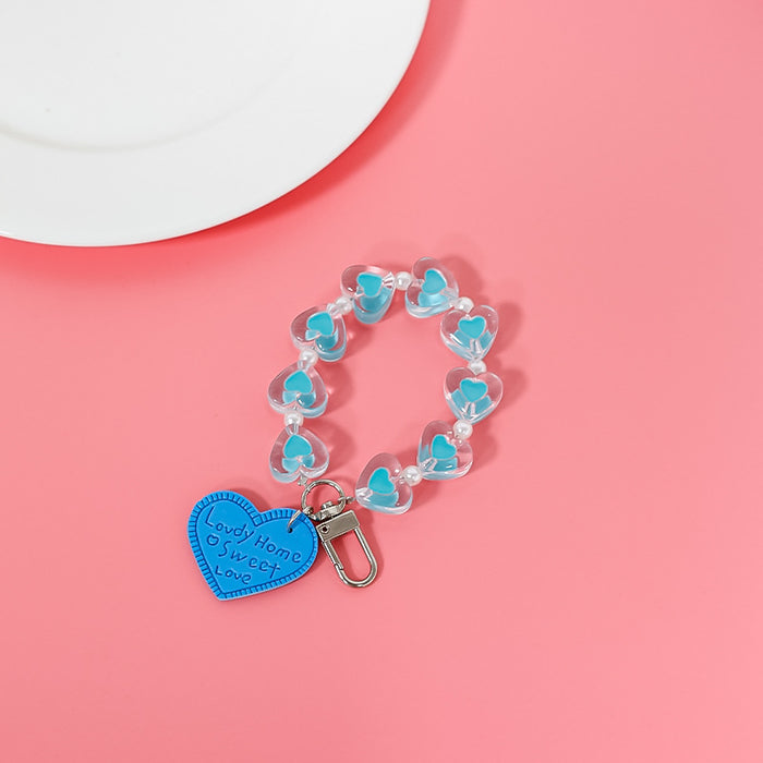 Wholesale fresh simple color love hand chain transparent acrylic chain mobile case accessories