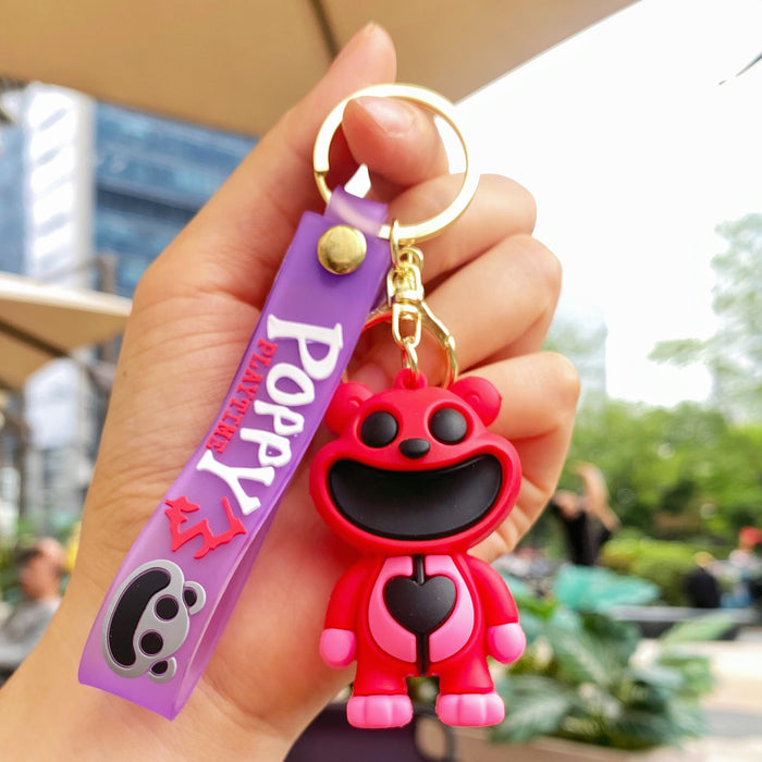 Wholesale Cute silicone smiling animal keychain