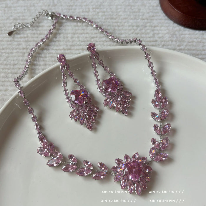 Wholesale Design a high-end sparkling diamond luxury necklace earring set with a heart and temperament accessory