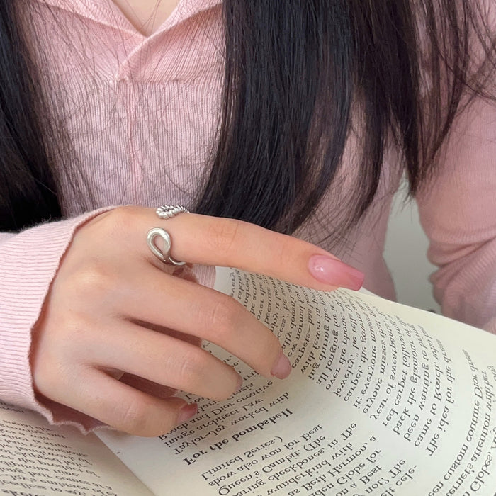 Wholesale Water drop hollowed out Fried Dough Twists opening ring is versatile, fashionable, personalized, high-level, small ring