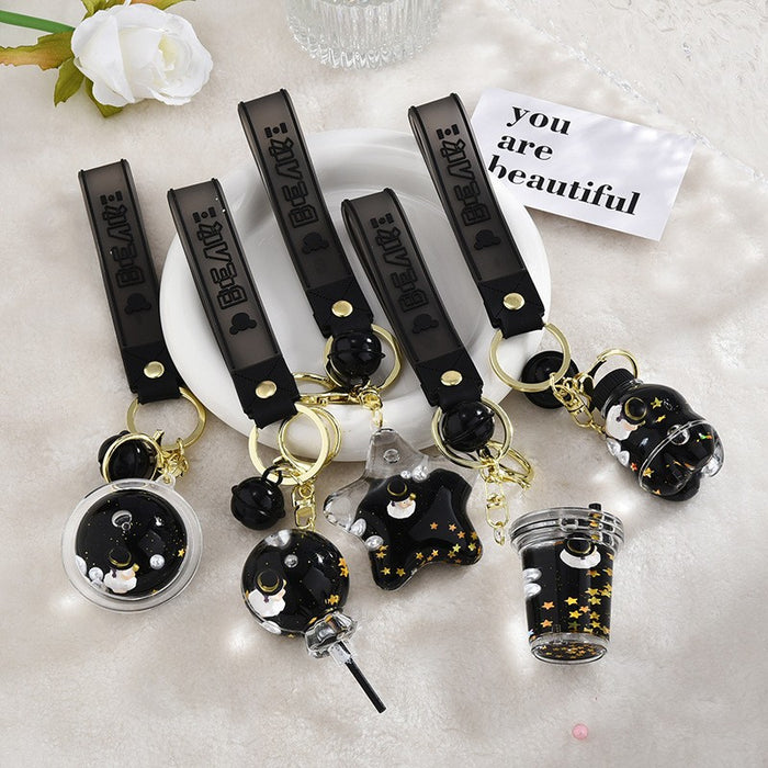 Wholesale Black and gold glitter bottle milk tea cup oil-filled acrylic keychain