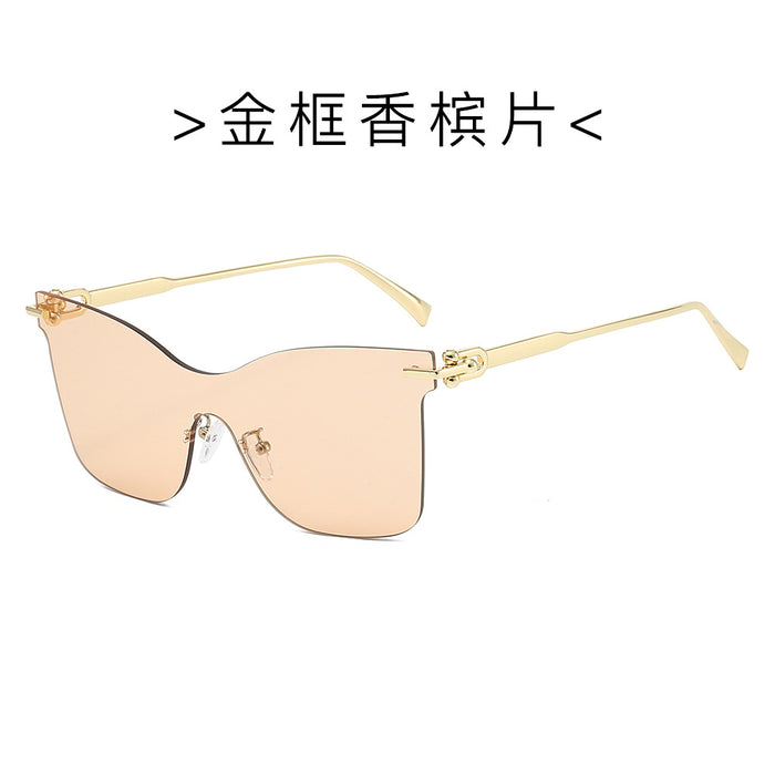 Wholesale Frameless one-piece sunglasses with a high-end feel, personalized trendy glasses, UV resistant cat eye retro sunglasses