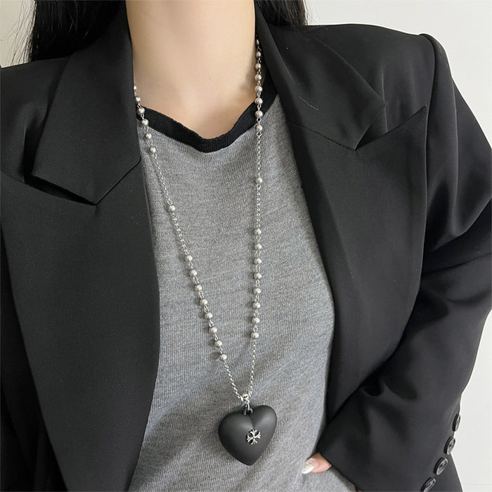 Wholesale Black cross heart pendant necklace, women's light luxury high-end feeling, pearl sweater chain long, versatile accessories for autumn and winter
