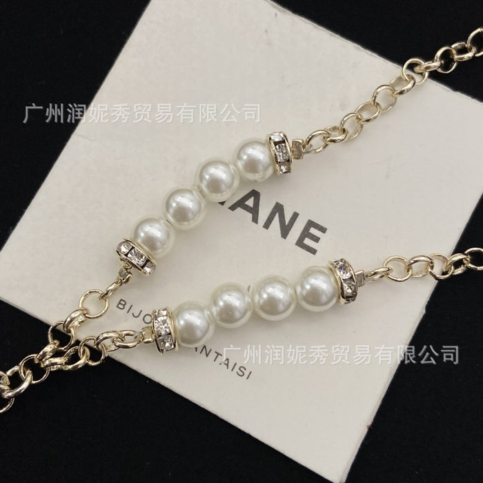 Wholesale Gradient tassel heart-shaped pearl necklace, pink diamond heart-shaped collarbone chain