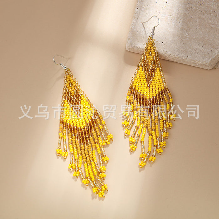 Wholesale color Bohemian rice bead earrings women' s minority ethnic hand-woven long tassel earrings
