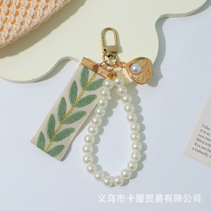 Wholesale Ribbon car alloy keychain pendant creative leaf striped pearl accessory bag decoration