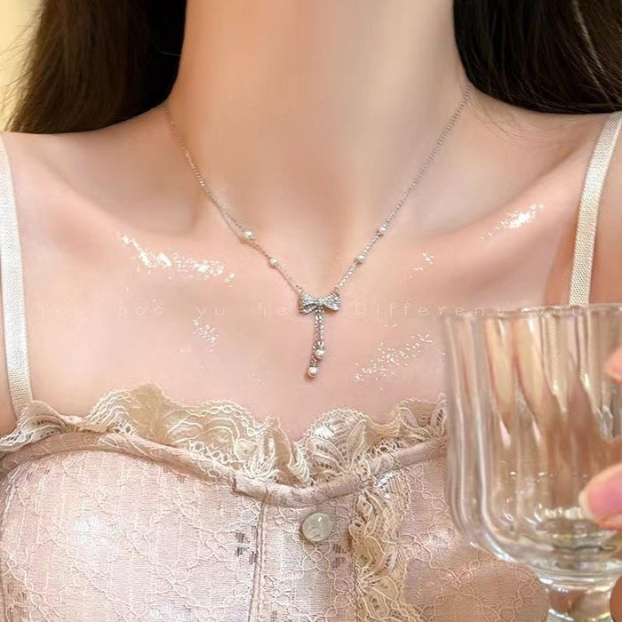 Wholesale Pearl bow tassel necklace, light luxury, niche collarbone chain, high-end necklace, versatile accessories and accessories