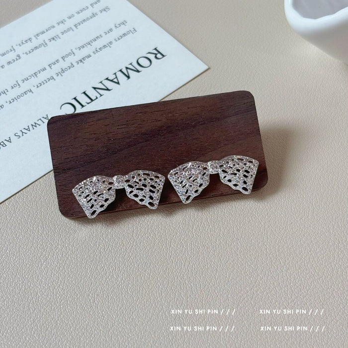 Wholesale Girl's artwork earrings with exquisite temperament, elegant fashion, and high-end feel. Earrings with hollowed out butterfly earrings