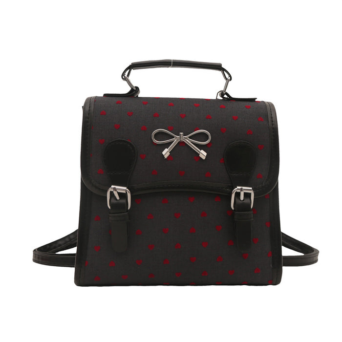 Wholesale Casual and fashionable handbag with heart-shaped printed canvas shoulders