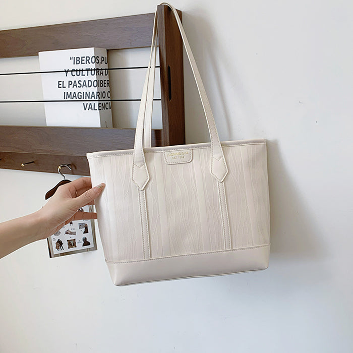 Wholesale Ladies' personalized bucket bag, large capacity commuting bag, single shoulder armpit bag