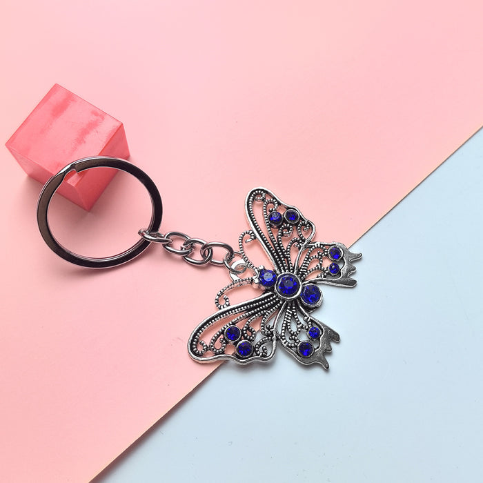 Wholesale Blue Eye Pendant Flower Butterfly Keychain Pendant Bag