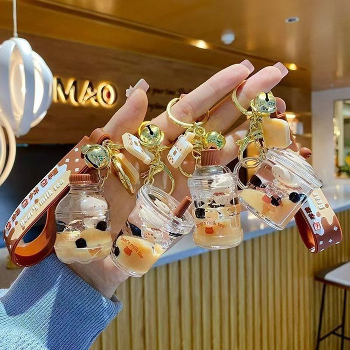 Wholesale bubble tea keychain floating small milk bear liquid quicksand bottle pendant couple gift bag hanging ornaments for women