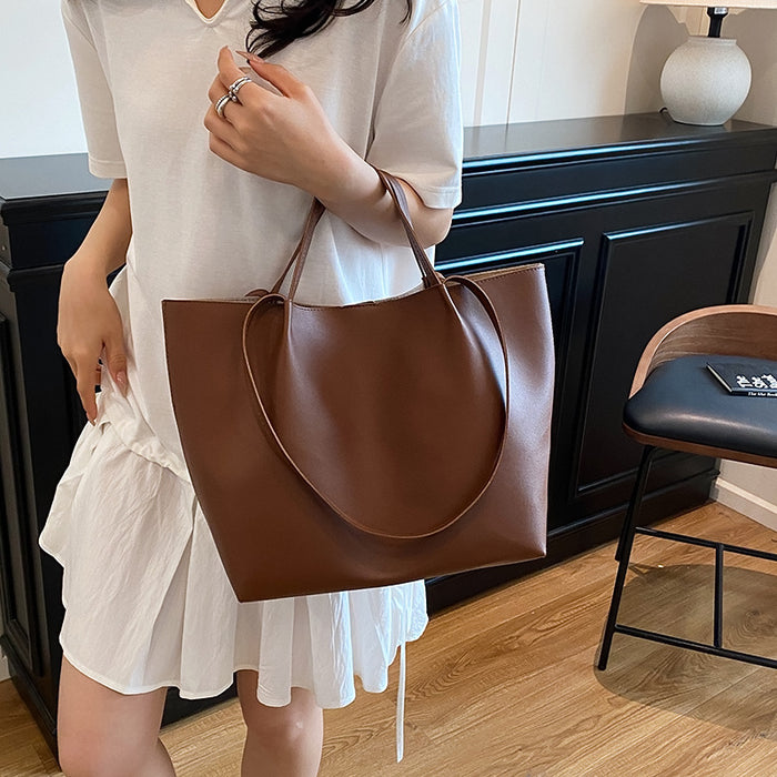 Wholesale Large underarm bag for women,  new style,  high-end solid color,  versatile handbag,  shoulder bag,  large capacity commuter tote bag