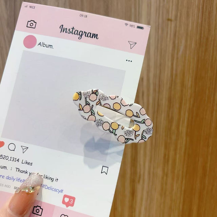 Wholesale Cute kids'  hair clips with various flower patterns