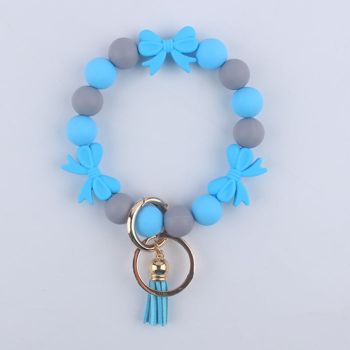 Wholesale Cartoon bow silicone bracelet keychain handmade beaded bracelet jewelry