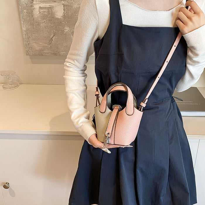 Wholesale Children's bag, high-end color blocked mini bucket bag, hand-held bucket bag, crossbody bag