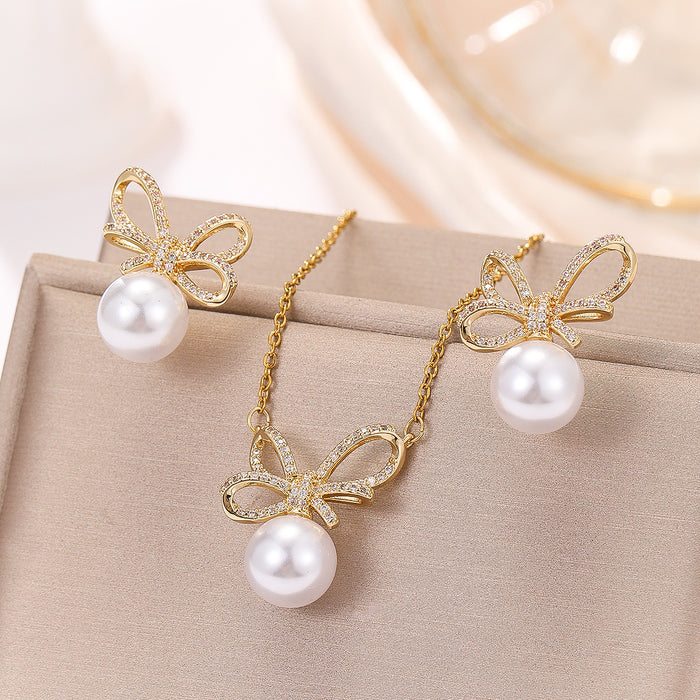 Wholesale Light Luxury Small and Exquisite Elegant Sweet Fashion All-match Women's High-end Bowknot Pearl Necklace Earrings suit