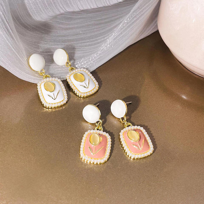 Wholesale Small niche design pearl cat eye stone tulip earrings, new exquisite and gentle daily earrings