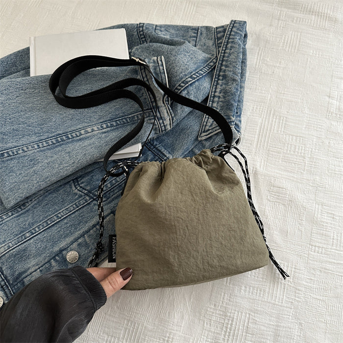 Wholesale Lightweight sports shoulder crossbody bag, casual large capacity, fashionable pleated bucket bag