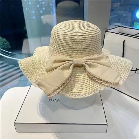 Wholesale Bow hat, large brimmed straw hat, sun hat, fashionable sun hat