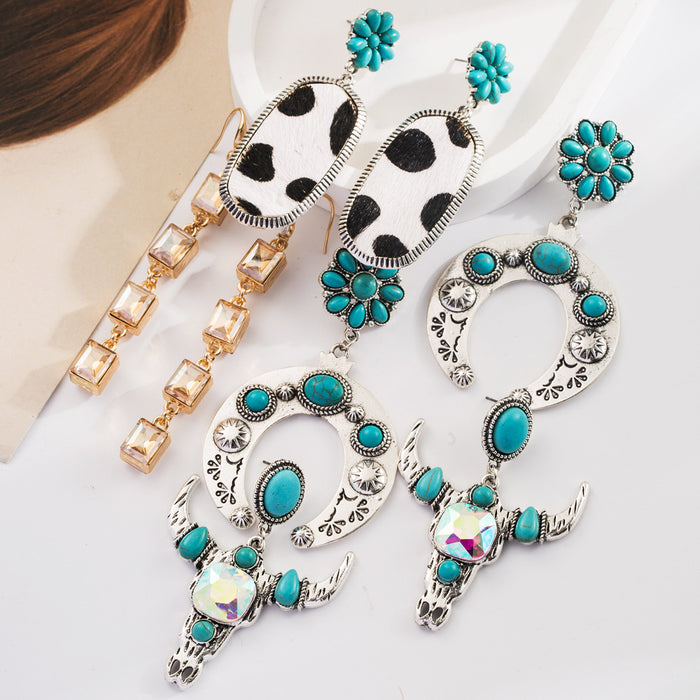 Wholesale Turquoise milk-textured leather earrings with diamonds and openwork design