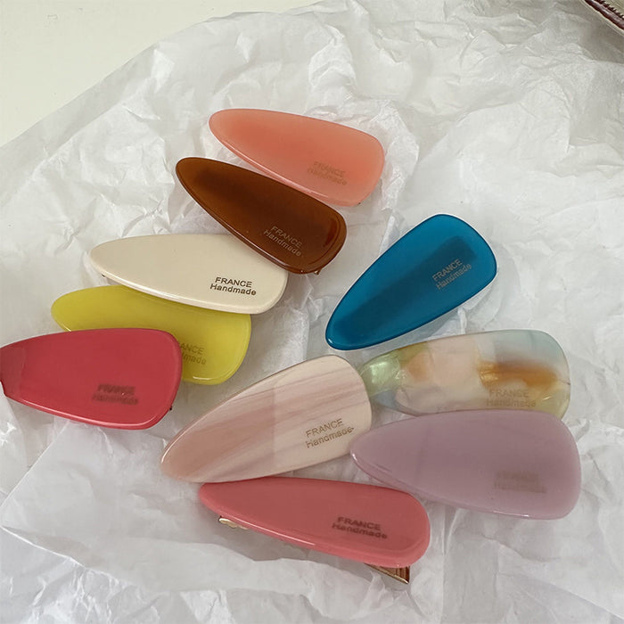 Wholesale Elliptical hair clip with side bangs, simple and elegant headband clip