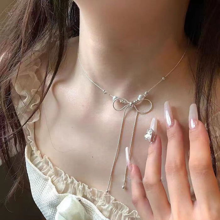 Wholesale Super beautiful bow long necklace, light luxury temperament, niche collarbone chain, fashionable and versatile necklace