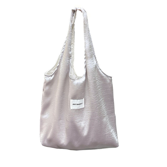 Wholesale Small niche design, environmentally friendly silver shoulder bag, large capacity leisure commuting shopping bag, handheld