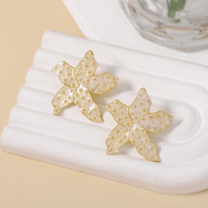 Wholesale Simple Oil Dripping Flower Starfish Zinc Alloy Earrings JDC-ES-YueLi006