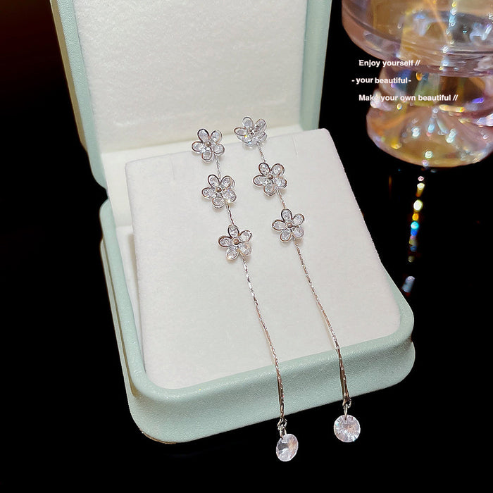 Wholesale Temperament long tassel earrings for female niche design, high-end earrings, new copper zircon petal earrings