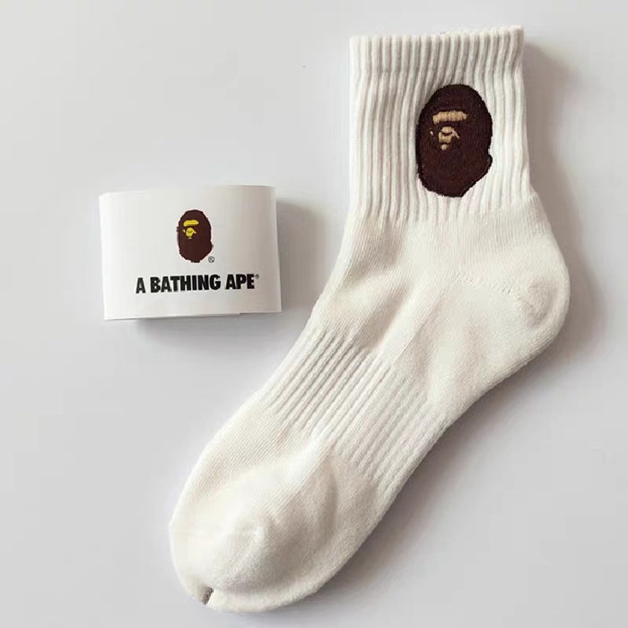 Wholesale Medium length towel bottom socks, high top sports long tube, embroidered white