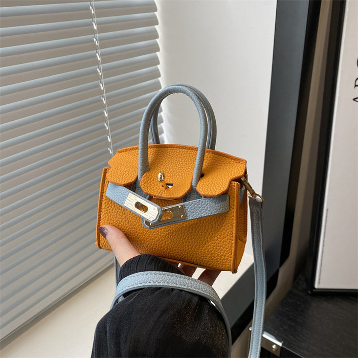 Wholesale New fashionable lychee patterned mini Kelly bag for girls, contrasting color crossbody bag