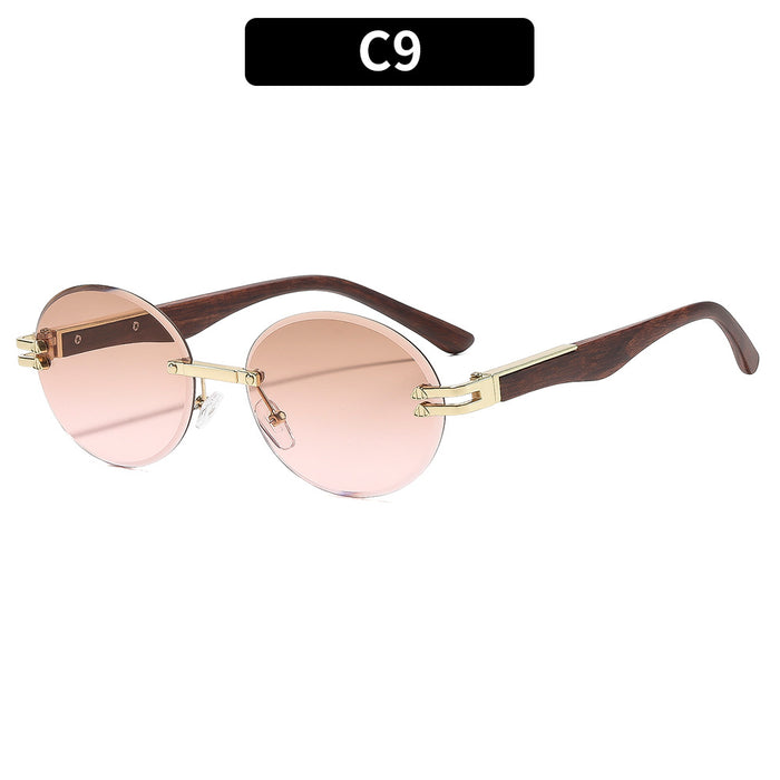 Wholesale Rimless Gold Frame Round Sunglasses UV400 Trendy Street Style for Women