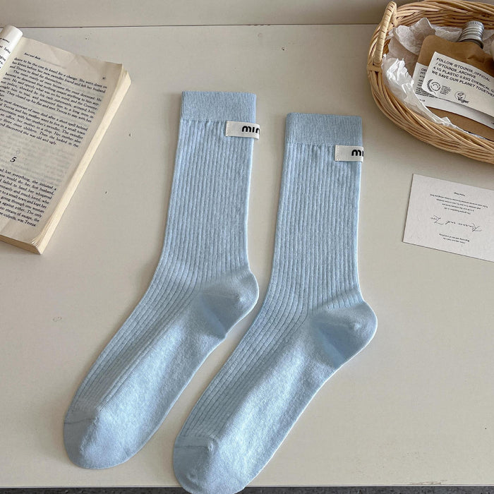 Wholesale Medium length socks with solid color letters, fabric labels, stacked socks, thin cotton socks, sweat absorbing and breathable