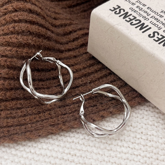 Wholesale Personalized, simple, fashionable style, irregular geometric winding earrings, silver needle temperament, light luxury earrings for women