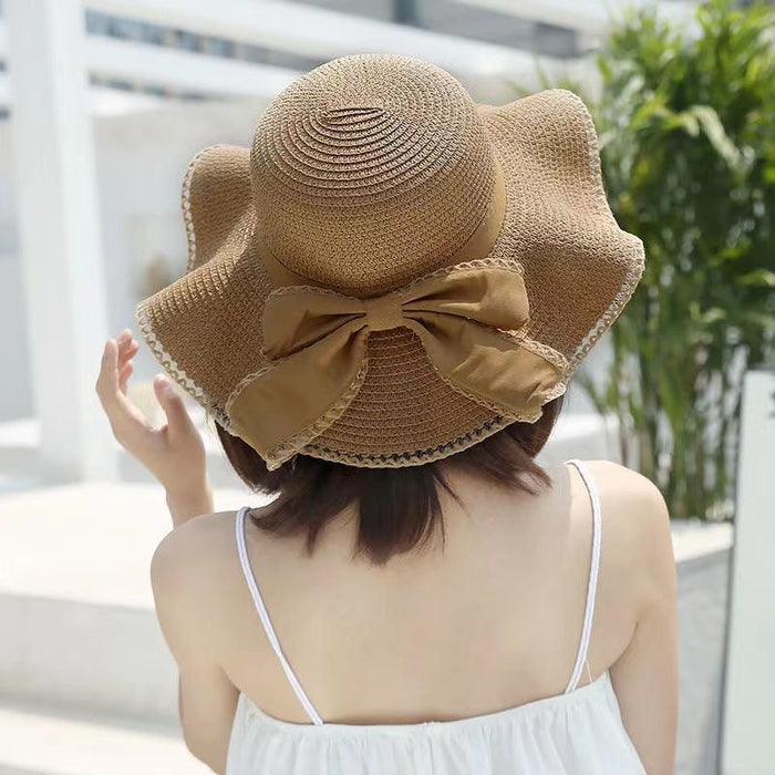 Wholesale Bow hat, large brimmed straw hat, sun hat, fashionable sun hat
