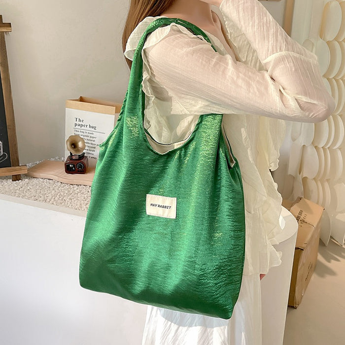 Wholesale Small niche design, environmentally friendly silver shoulder bag, large capacity leisure commuting shopping bag, handheld